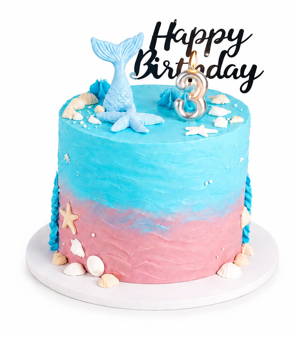 Birthday cake decorated with a sculpted mermaid tail