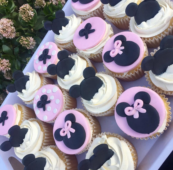 Red, black and white character themed cupcakes with polka dot decoration